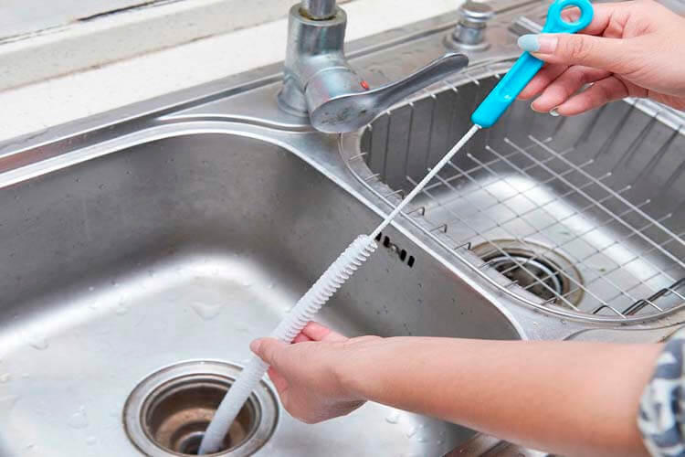 cómo desatascar tuberías